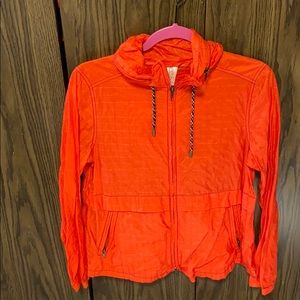 Free People Orange packable jacket with hood